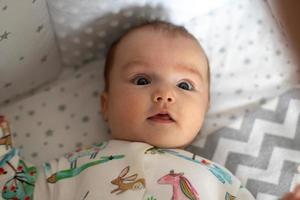 closeup portrait of a beautiful little baby girl photo