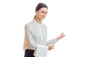 Charming waitress in uniform posing in studio photo