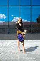 beautiful woman with a bouquet of hydrangeas photo