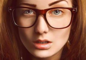 Horizontal portrait of caucasian woman in glasses photo