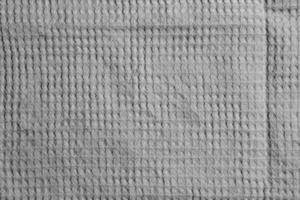 White cotton waffle fabric texture as background photo