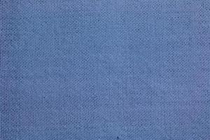 Texture of natural linen as background in blue color photo