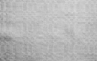 Geometric pattern on linen. Template for textiles. Natural linen fabric as background. photo