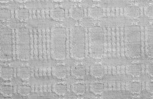 Geometric pattern on linen. Template for textiles. Natural linen fabric as background. photo