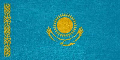 Flag of Kazakhstan on a textured background. Concept collage. photo