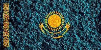 Flag of Kazakhstan on a textured background. Concept collage. photo
