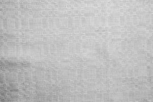 Geometric pattern on linen. Template for textiles. Natural linen fabric as background. photo