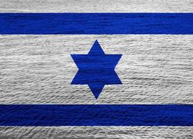 Flag of Israel on a textured background. Concept collage. photo