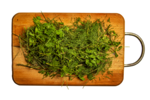 Dried chopped dill and parsley leaves as a natural background. Spices. Healthy food concept.