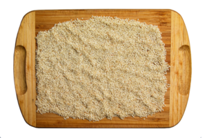 Sesame seeds on a wooden kitchen board. Healthy food concept. png