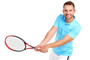 hombre jugando tenis foto