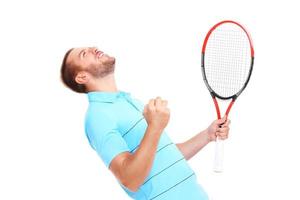 hombre jugando tenis foto