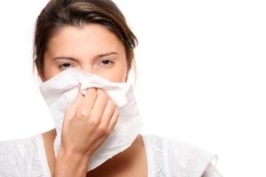 Woman with Runny nose photo