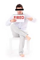 Man with fired sign photo