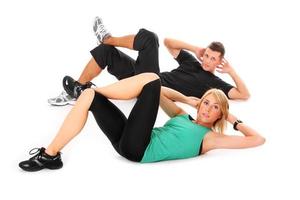 hombre y mujer haciendo ejercicio foto