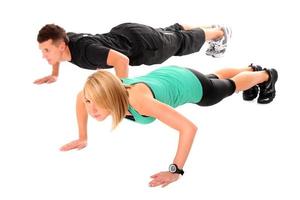 Man and woman working out photo