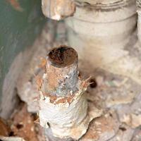 Old water pipe clogged with rust photo