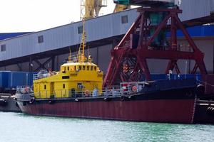 Tugboat in a port photo