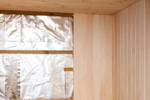 Wooden walls of a traditional sauna. Construction in progress photo