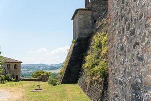 Torrechiara,Italy-July 31, 2022-View of Torrechiara castle in the province of Parma during a sunny day photo