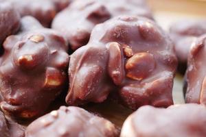 close up of peanut chocolate candy on table photo