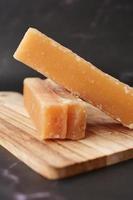 Jaggery traditional cane sugar cube on table photo