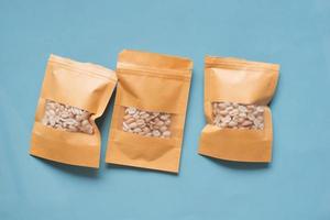 top view of peanuts in a packet on table photo