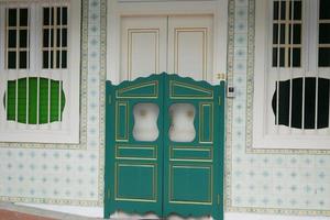 a brown wood old door in singapore photo