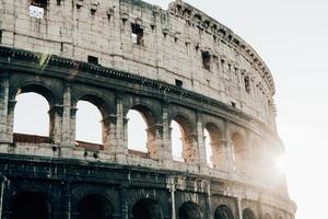 Rome, Italy, the Colosseum is an old ancient building of the battle of gladiators. photo
