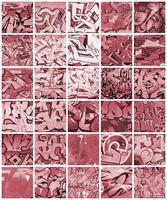 A set of many small fragments of graffiti drawings. Street art abstract background collage in red colors photo