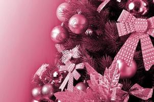 Christmas tree details Image toned in Viva Magenta, color of the 2023 year photo