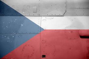 Czech flag depicted on side part of military armored helicopter closeup. Army forces aircraft conceptual background photo