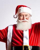 Cheerful Santa Claus is placing gift boxes. Merry Christmas and happy holidays. photo