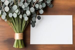 Mockup for a letter or wedding invitation with branches and leaves. Natural light and shade coverage. photo