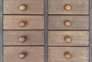 Wooden cabinet with several drawers photo