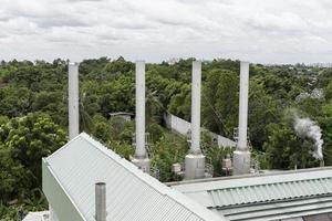 Industrial roofs and chimneys of brewing boilers photo