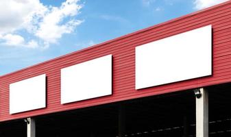 Mock up billboard on building with blue sky background photo