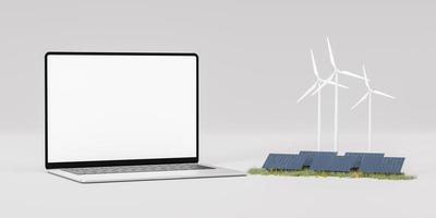 Laptop near solar panels and wind turbines photo