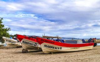 Puerto Escondido Oaxaca Mexico 2022 Fishing boats at the harbor beach in Puerto Escondido Mexico. photo