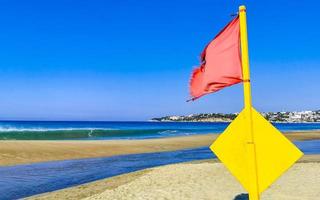 Red flag swimming prohibited high waves in Puerto Escondido Mexico. photo