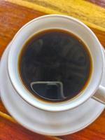 Cup of americano black coffee in restaurant Mexico. photo