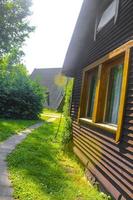 Brown vacation cottage house made of wood in nature Germany. photo