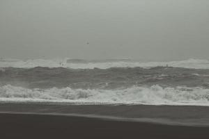 Rough ocean at stormy weather monochrome landscape photo