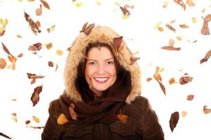 Woman with autumn leaves photo