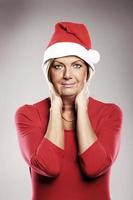 Woman with Santa hat for Christmas photo