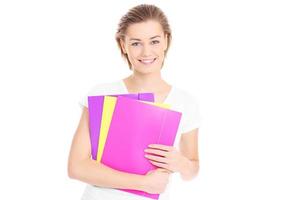 chica estudiante con carpetas de colores foto