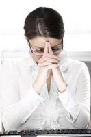 Tired businesswoman in the office photo