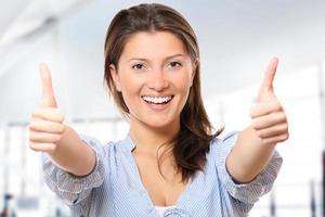 Woman with thumbs up photo