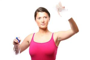 Woman cleaning window photo