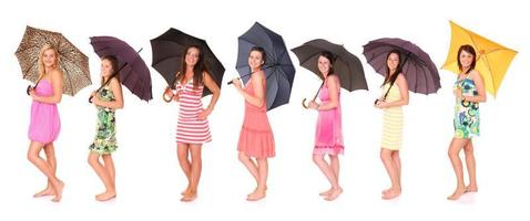 Set of women with umbrellas photo